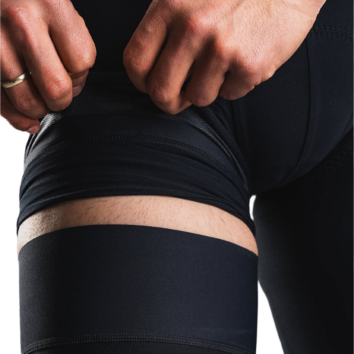 Fusion Tempo unisex legvarmer med sort stof omkring benet