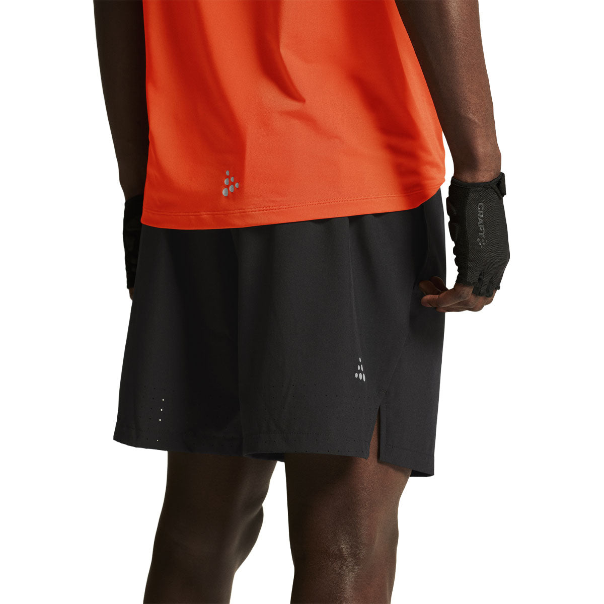 Craft herre shorts i sort med orange topkant og slidser