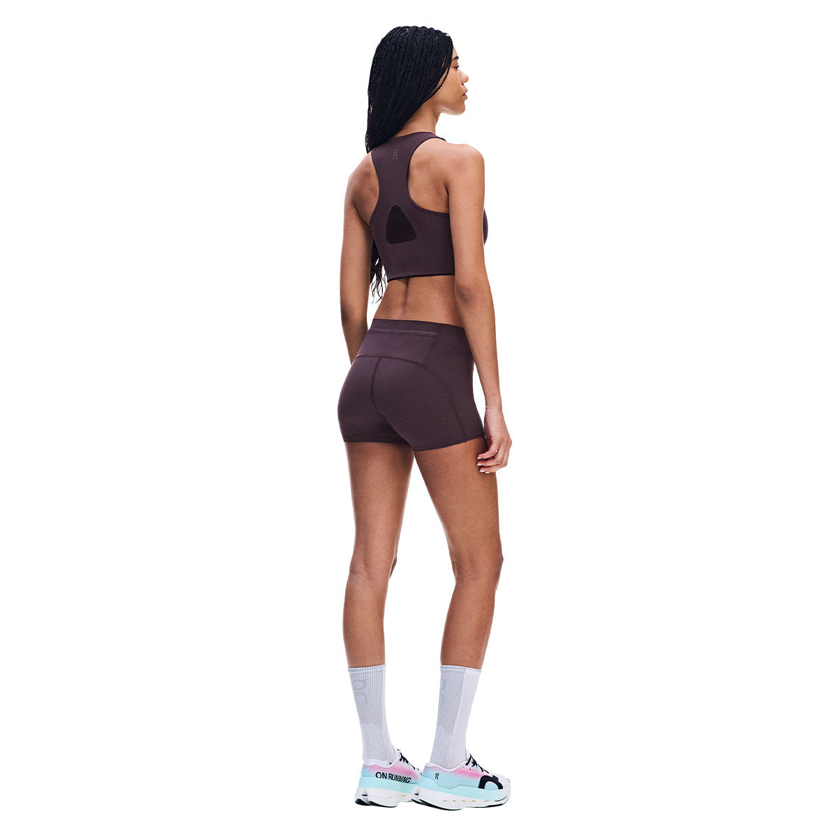 On Running korte tights til dame i mørk lilla, set bagfra