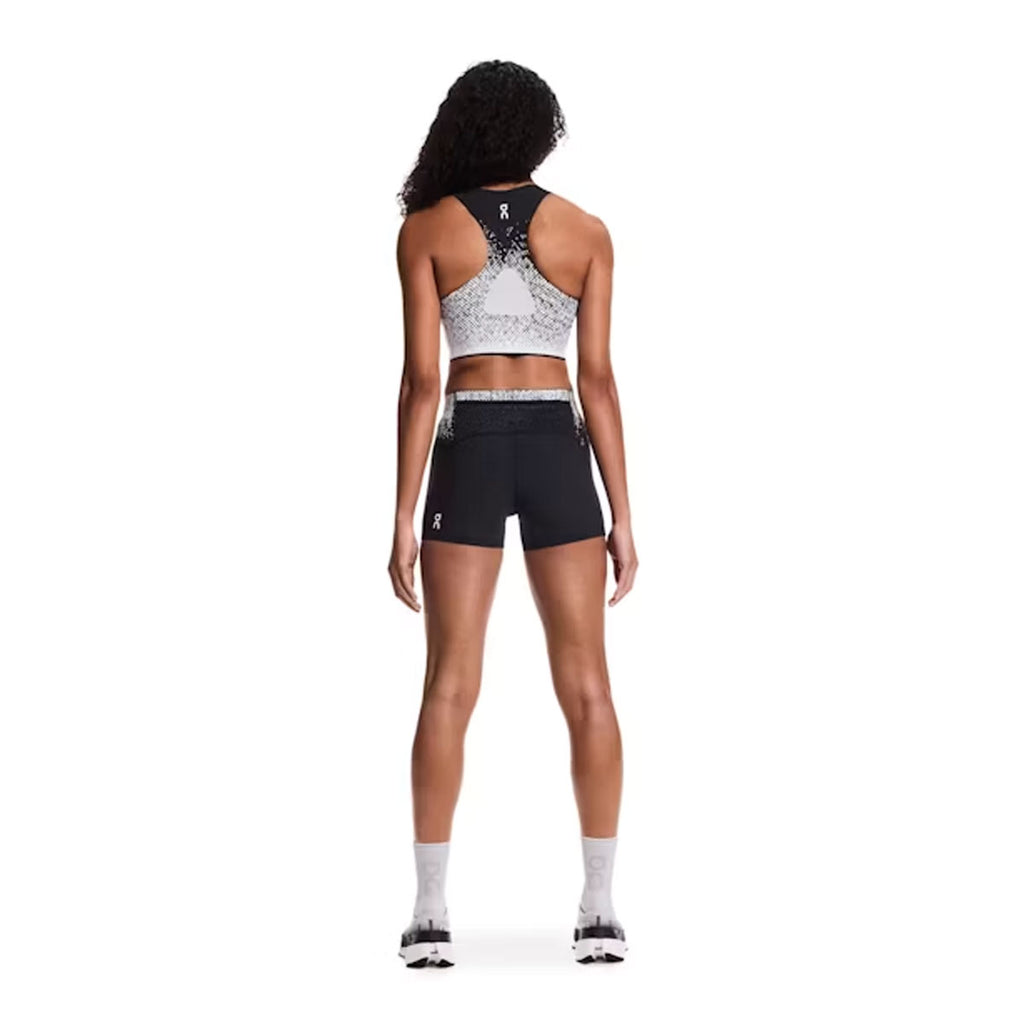 On Zero Crop Dame tanktop set forfra og bagfra, sort og grå