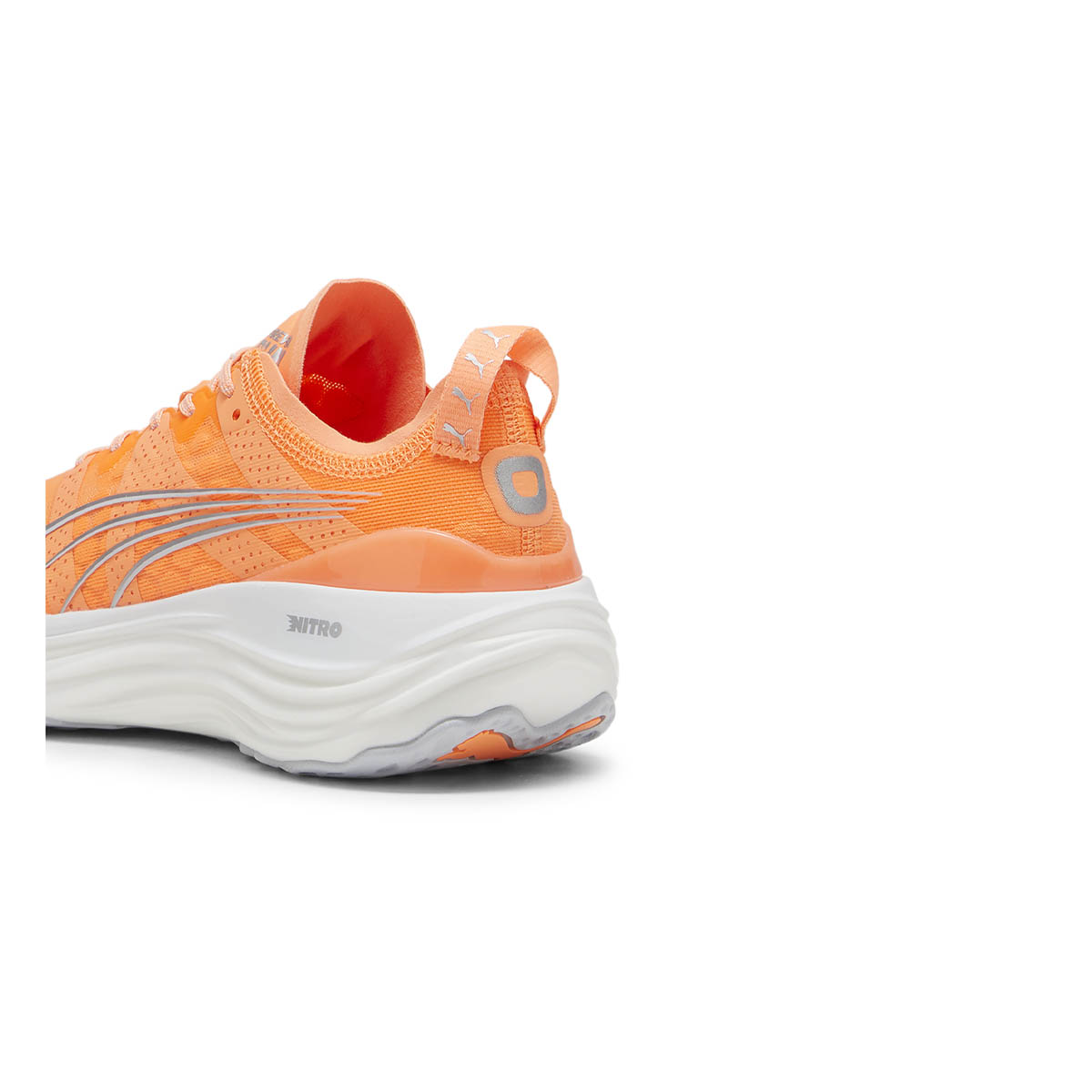 Puma ForeverRun NITRO women's running shoes in vibrant orange with reflective details.