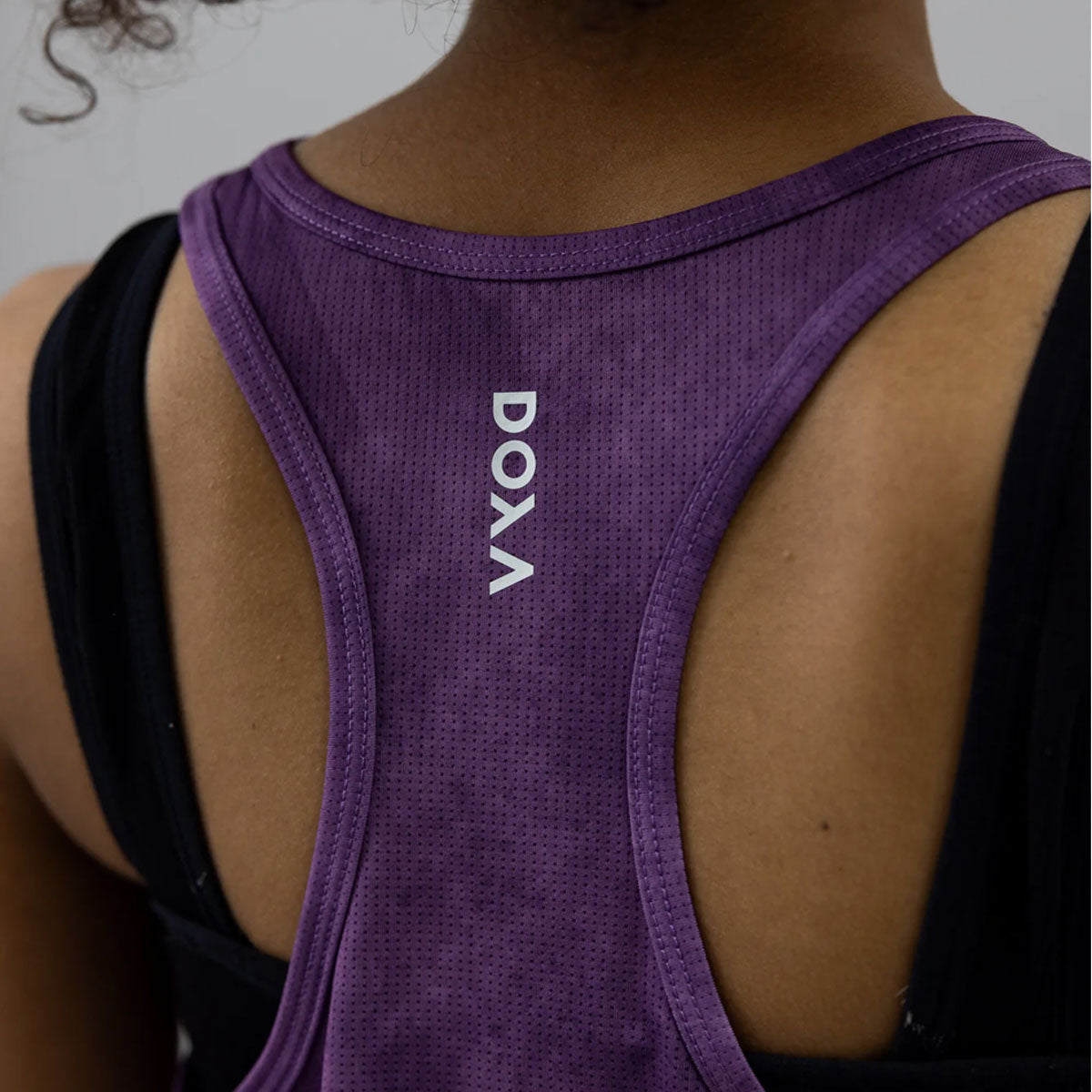 Lilla Doxa Rerun singlet med logo på ryggen til dame