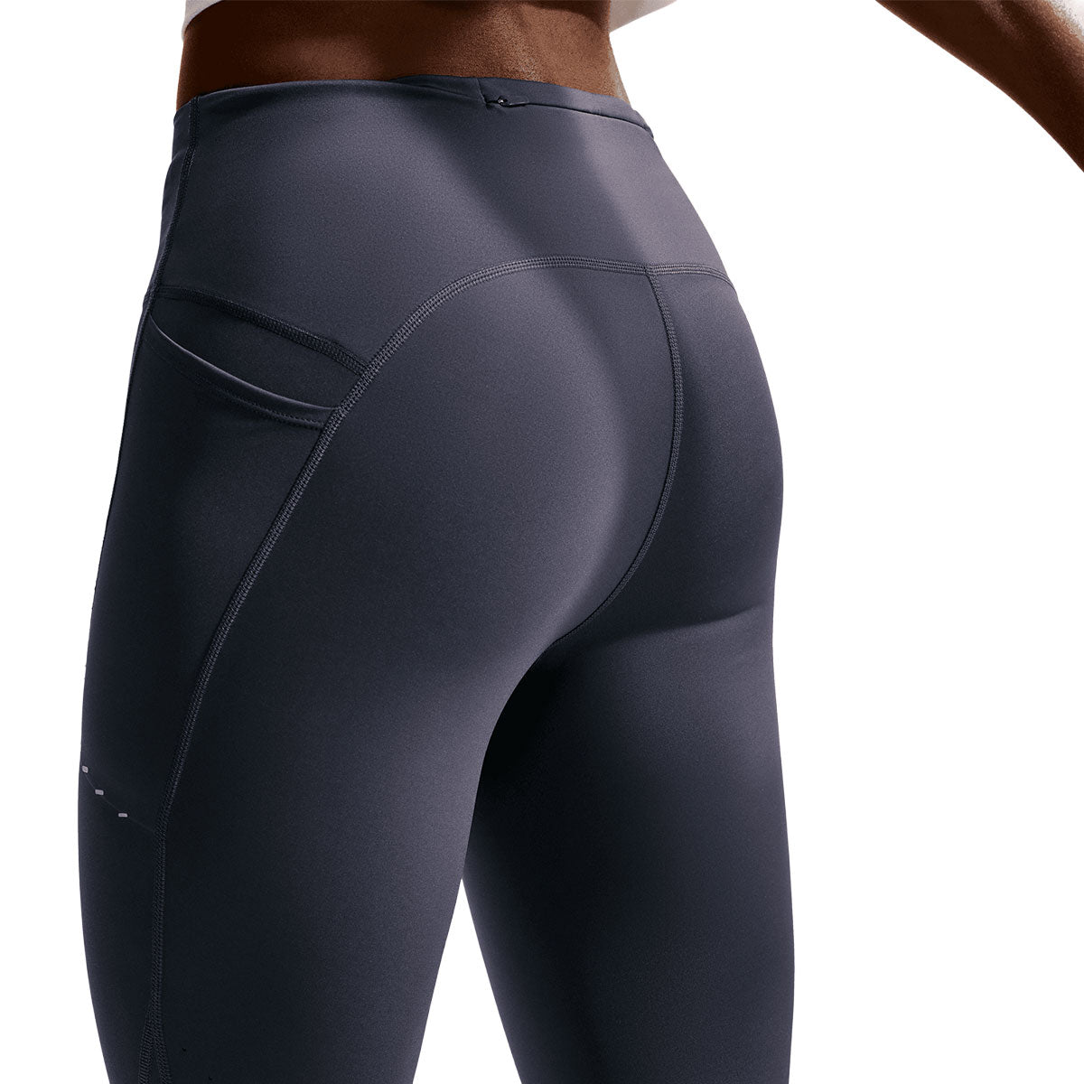 Nike Swift high-rise 7/8 tights med syninger og lommedetalje