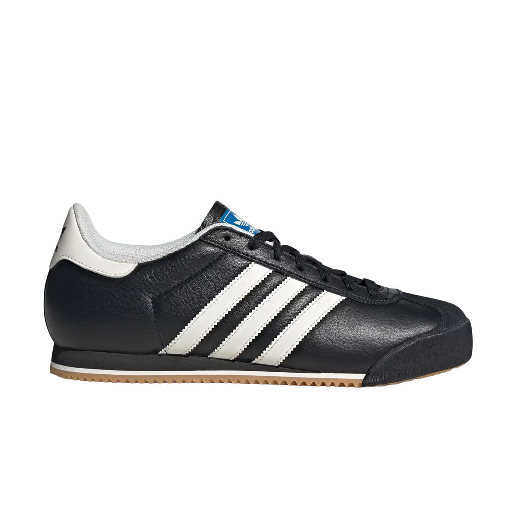 Adidas K74 herre walkersko i sort læder med hvide striber