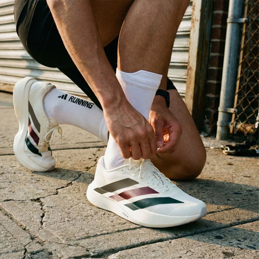 Adidas adizero Evo SL herreløbesko med hvid og grøn detalje