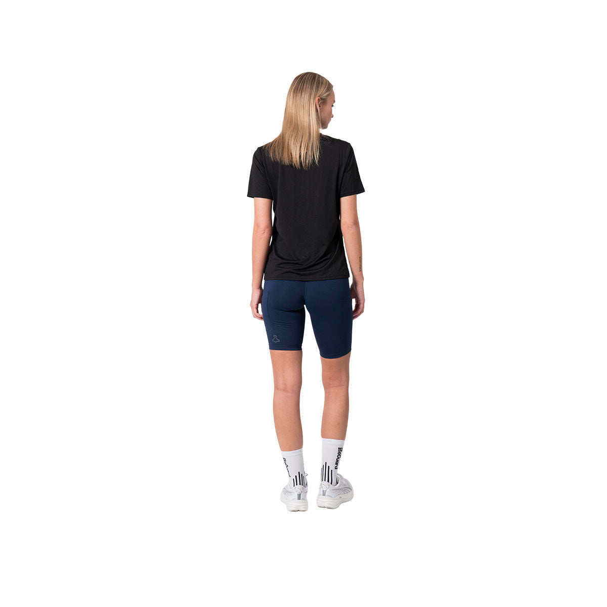 Kort tight dame i blå farve, set bagfra