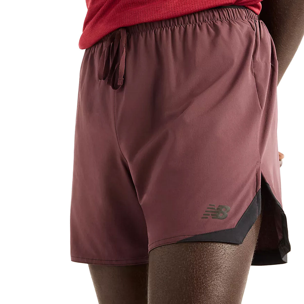 New Balance RC Essential herreshorts med elastisk linning og snøre