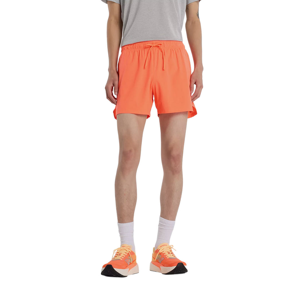 New Balance RC 5" shorts til herrer i orange farve