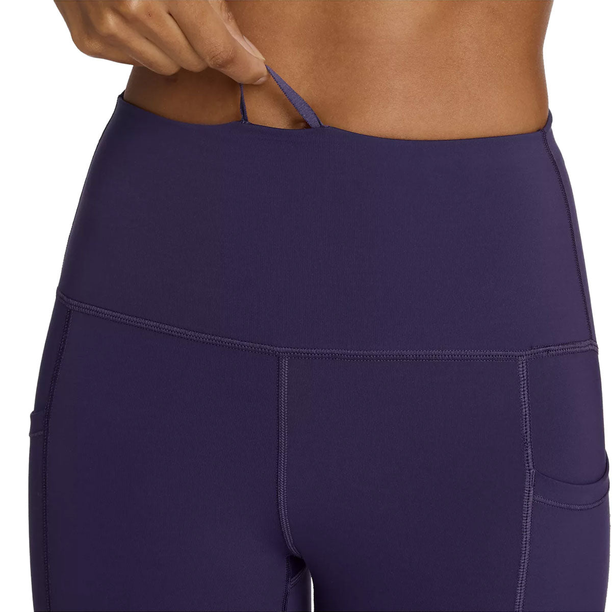 Højtaljede leggings med lomme i mørk lilla farve