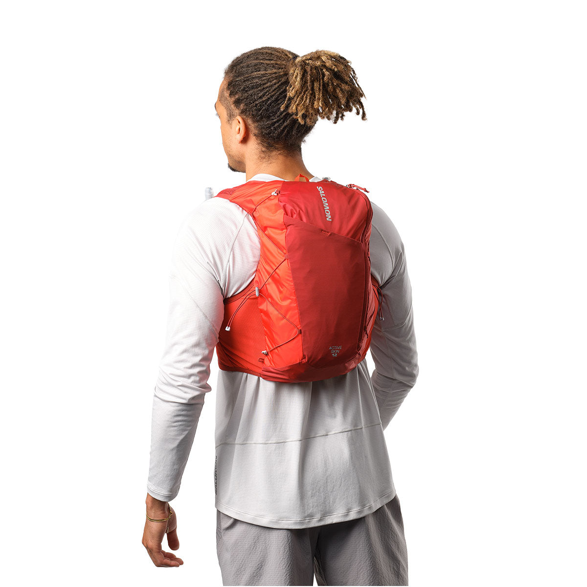 Salomon Active Skin 12 taske i rød til løb