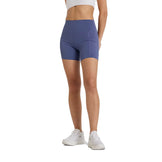New Balance Sleek Pocket High Rise Short 6" Dame