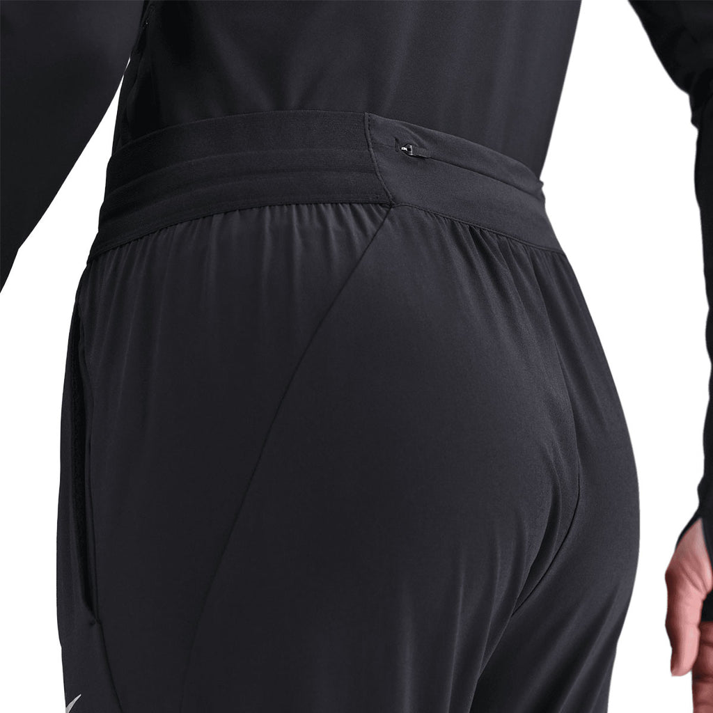 Nike Swift Dri-Fit mid-rise bukser til damer i sort