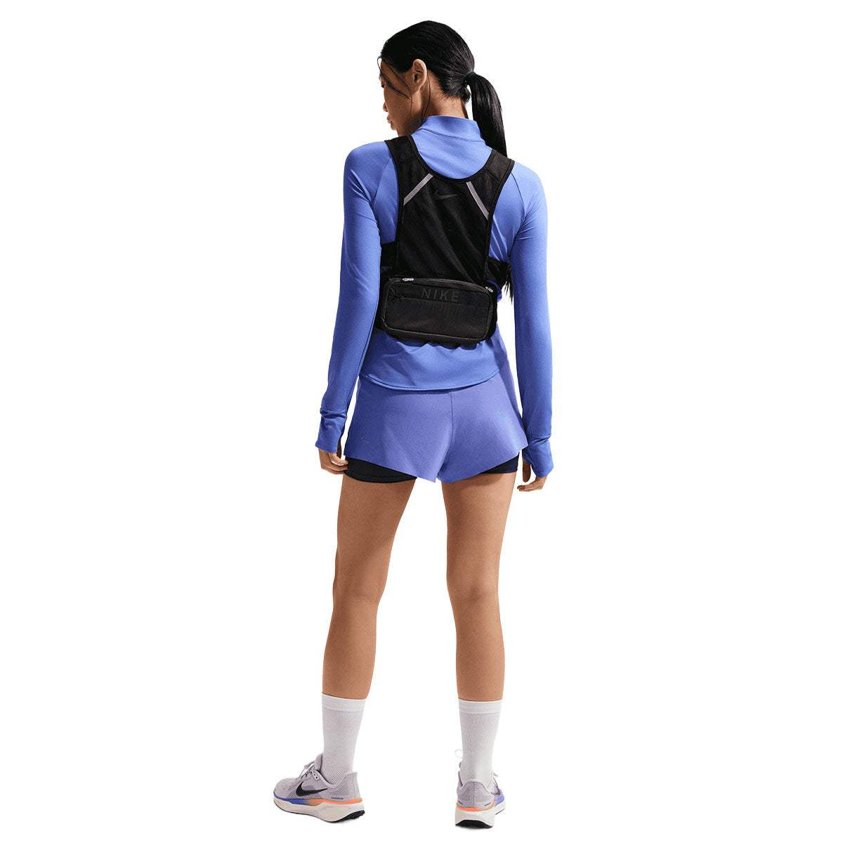 Nike Swift Mid-Rise 2i1 shorts dame i blå farve med sort rygdesign