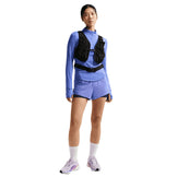 Nike Swift Mid-Rise 2i1 shorts til damer i lilla farve