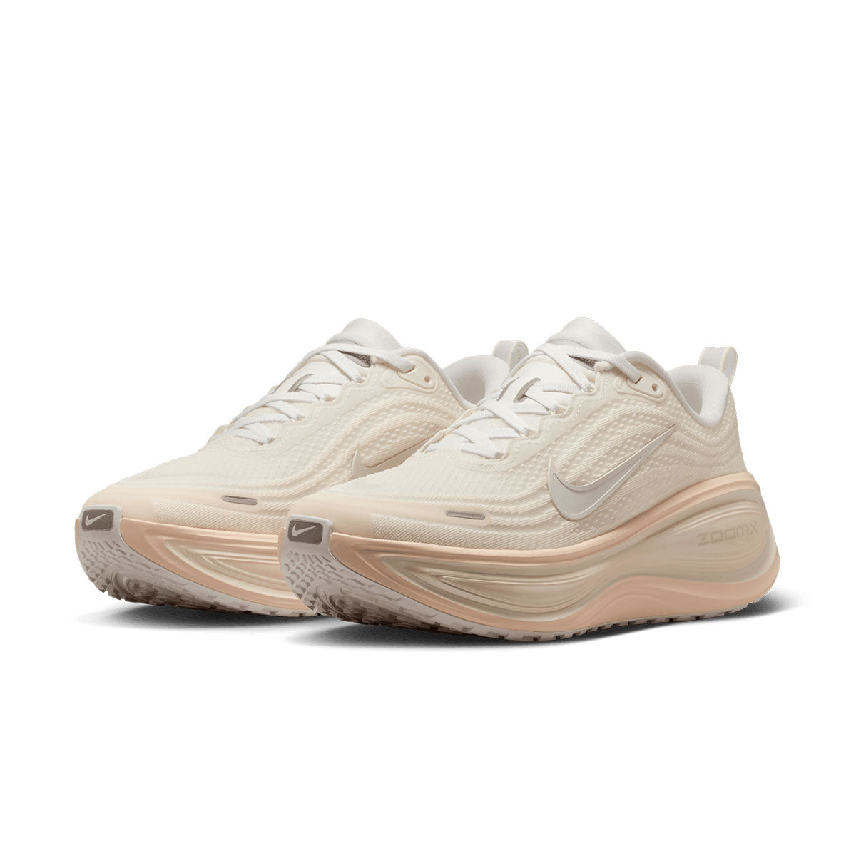 Nike Vomero Plus Dame løbesko i lys beige farve