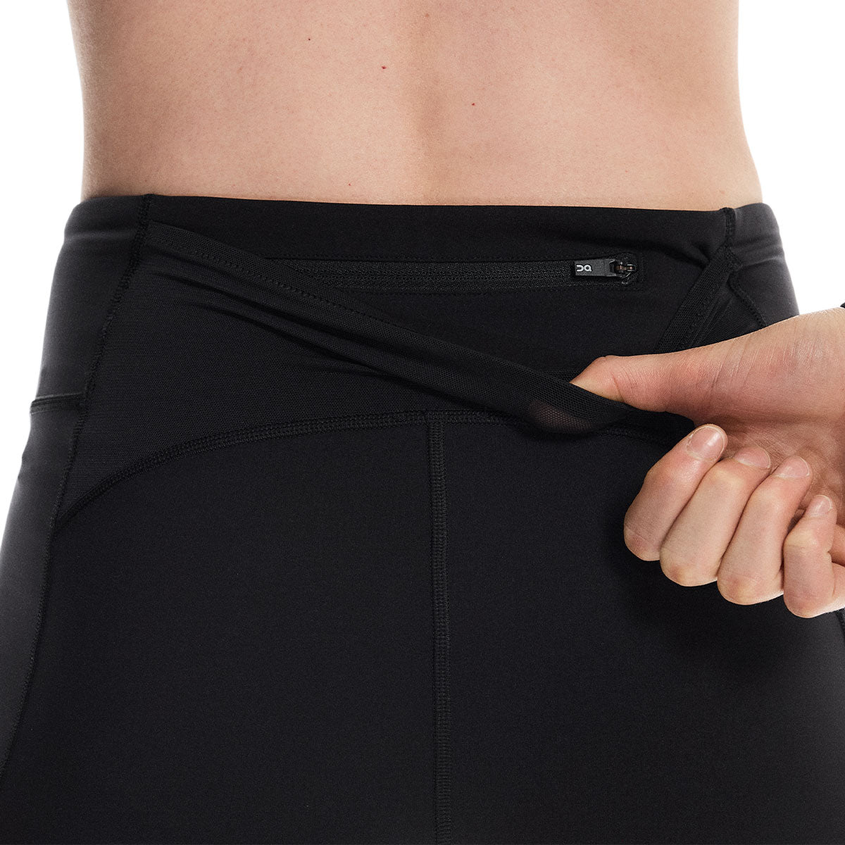 Korte tights med elastisk talje og lynlås lomme