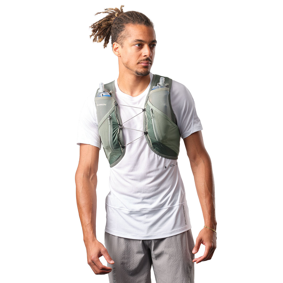 Salomon Active Skin 12 Set vest til vandreture i grøn farve