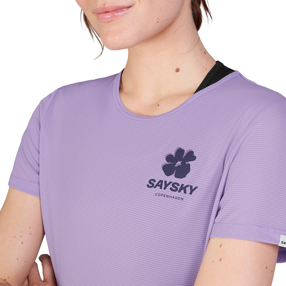 Lilla Saysky Flower Flow T-shirt til damer med blomsterlogo